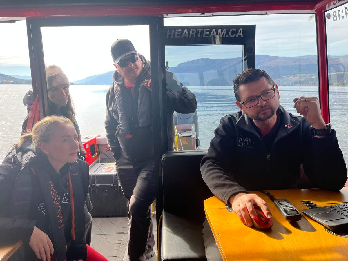 Manuel Maendel at the helm, Jaycee Martin and the HEART dive team crew watched the sonar as the boat slowly moved across Okanagan Lake, scanning the depths for signs of Kyle Yrjola.
