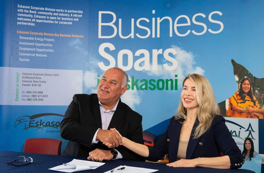 Eskasoni First Nation Councillor Bertram Bernard and Aeon Blue CEO Lark Meadow sign a joint venture agreement in Eskasoni, N.S. on Thursday Oct. 8, 2026. THE CANADIAN PRESS/Handout-Aeon Blue-Steve Wadden
(Mandatory Credit).