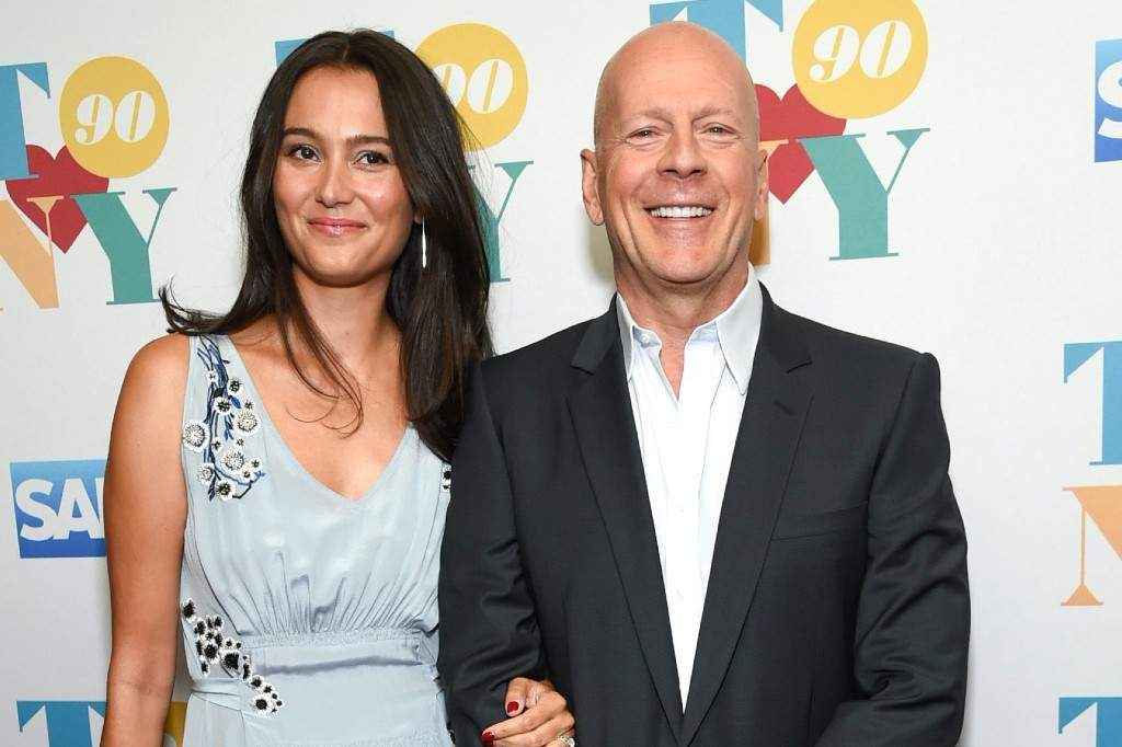 Actor Bruce Willis, right, and wife Emma Heming attend Tony Bennett's 90th birthday celebration at the Rainbow Room at Rockefeller Plaza on Wednesday, Aug. 3, 2016, in New York.