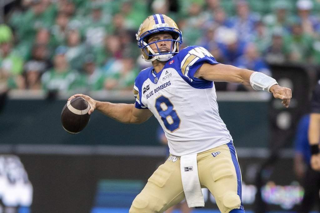 Winnipeg Blue Bombers quarterback Zach Collaros (8) throws the ball during first-half CFL action against the Saskatchewan Roughriders in Regina on Sunday, Sep. 6, 2026. THE CANADIAN PRESS/Kayle Neis.