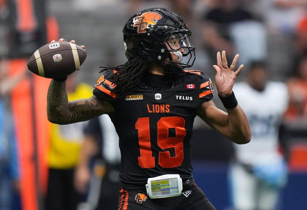 B.C. Lions quarterback Kaidon Salter (19) passes during the second half of a CFL football game against the Toronto Argonauts, in Vancouver, on Saturday, July 25, 2025. THE CANADIAN PRESS/Darryl Dyck.