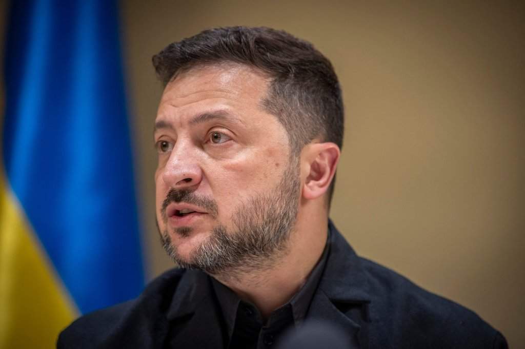 Ukrainian President Volodymyr Zelenskyy speaks to the media after a German-Ukrainian business forum in Kyiv, Ukraine, Sunday, Oct. 4, 2026. (AP Photo/Dan Bashakov).