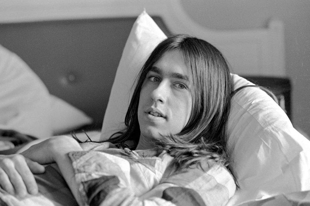 Singer David Surkamp of Pavlov's Dog relaxes in his hotel room, Los Angeles, CA 1975.