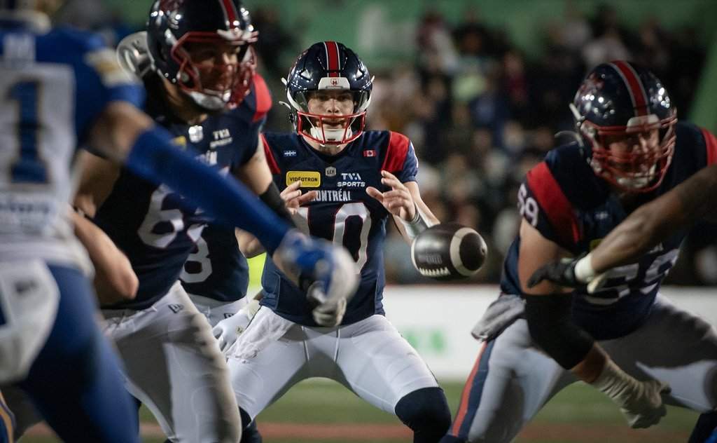 Montreal Alouettes Quarterback Davis Alexander takes the snap during second half CFL football action against the Winnipeg Blue Bombers in Montreal Saturday Oct. 3, 2026. THE CANADIAN PRESS/Peter McCabe.