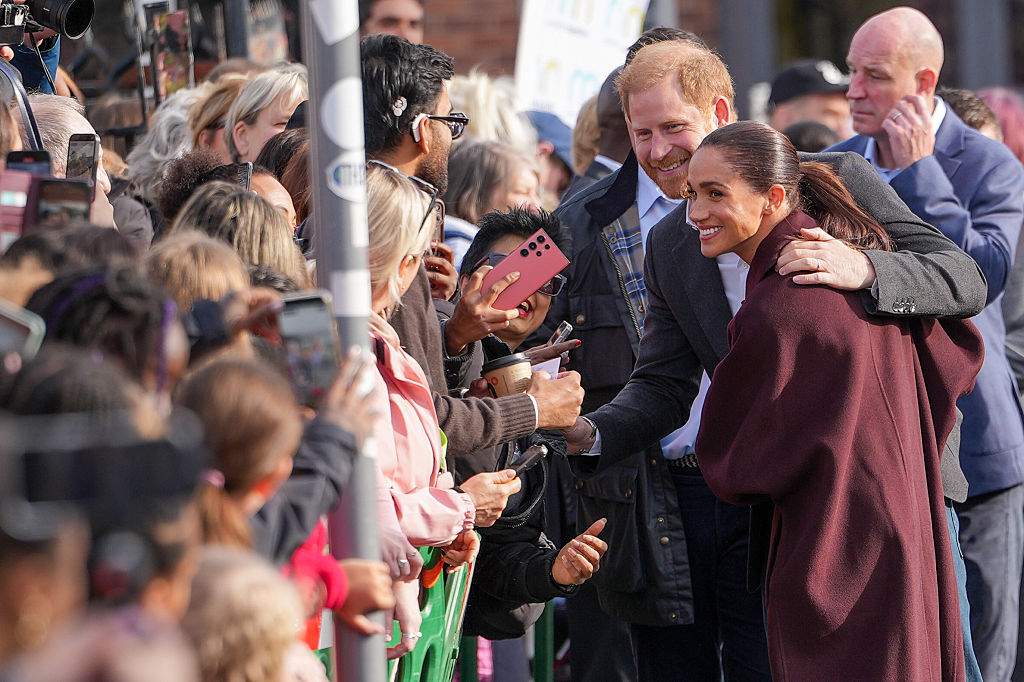 Prince Harry, Duke of Sussex and Meghan, Duchess of Sussex greet well-wishers as they arrive at the Community Recording Studio (CRS), a youth and community charity that offers a wide range of creative activities, sports, mentoring and youth development programs on October 15, 2026, in Nottingham, England.
