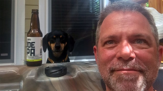 Enjoying the Hot Tub while Tally begs