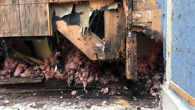 While replacing the siding, the contractor discovered extensive rot and moisture damage.