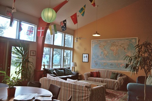 trip to austin for iacp: hostel common area with flags and maps