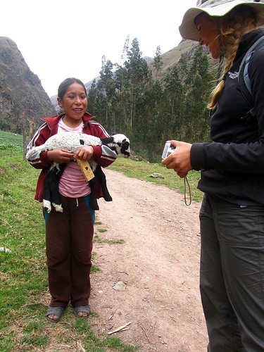 Rae talks with Julisa (and her lamb, Laurita)