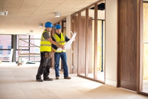 Apprentice in construction with mentor