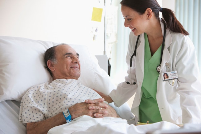 Nurse checking on patient
