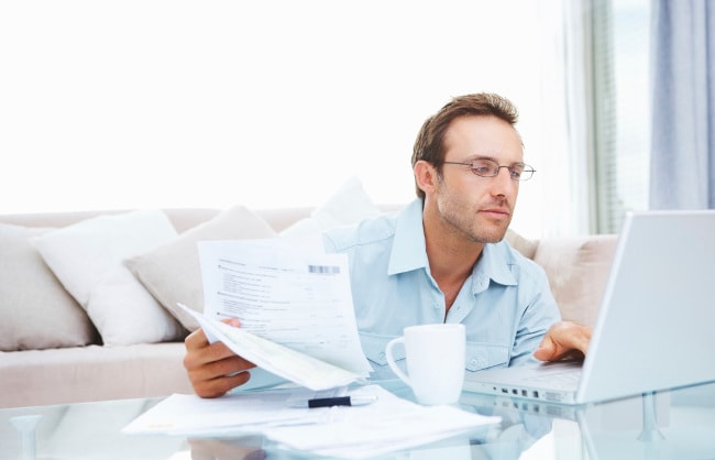 Man using computer at home