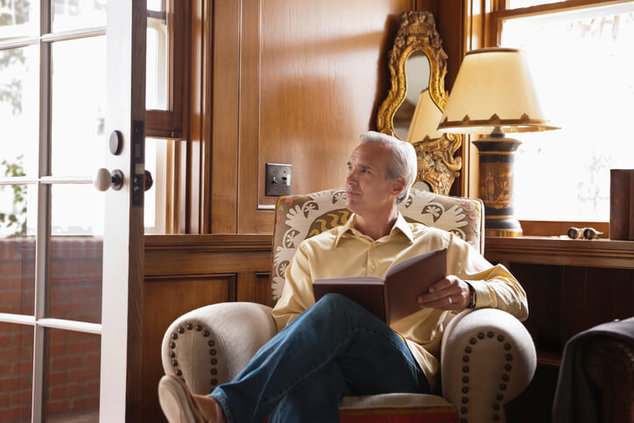 man reading book