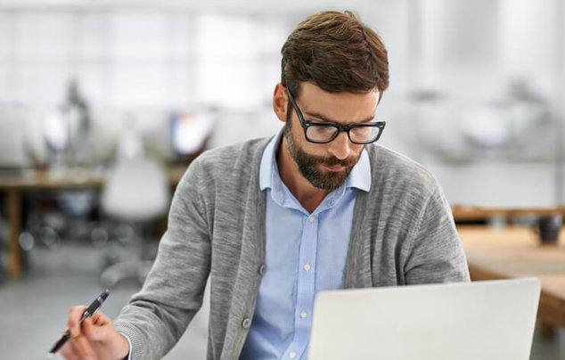 guy working at computer